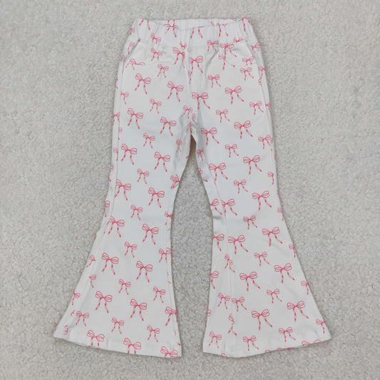 pink bow on white girl jeans