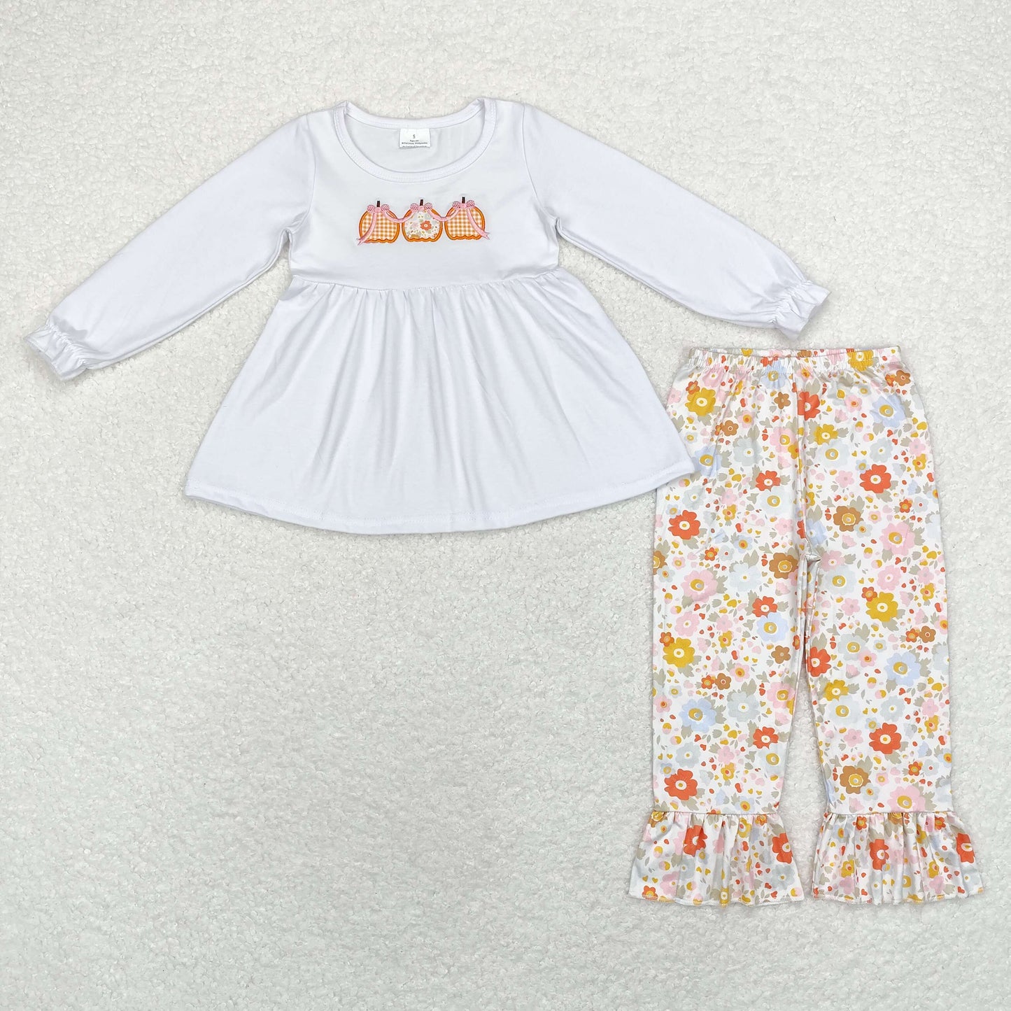 floral pumpkin embroidered pants outfit