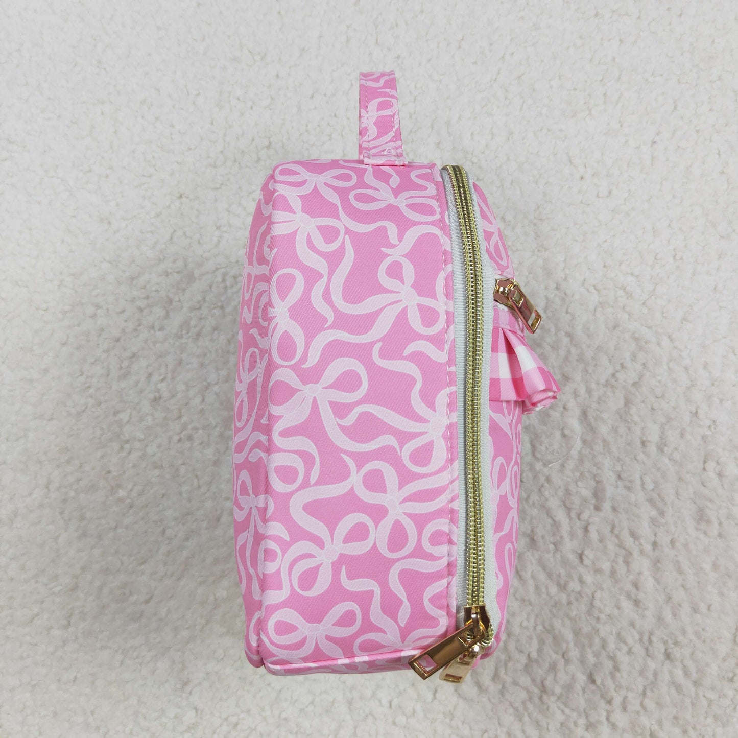 white bow on pink kids lunch box