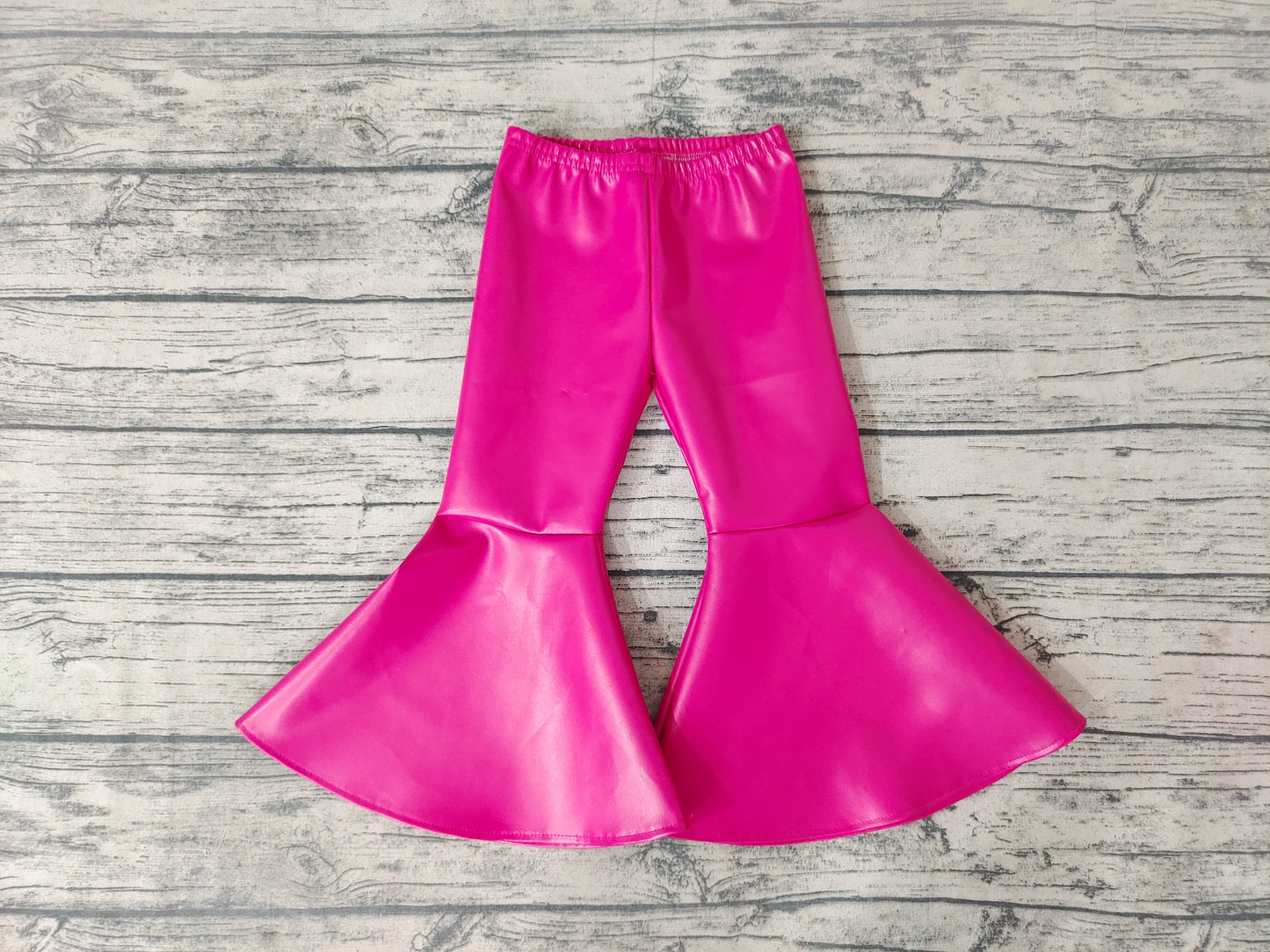 hot pink leather bell bottom trousers