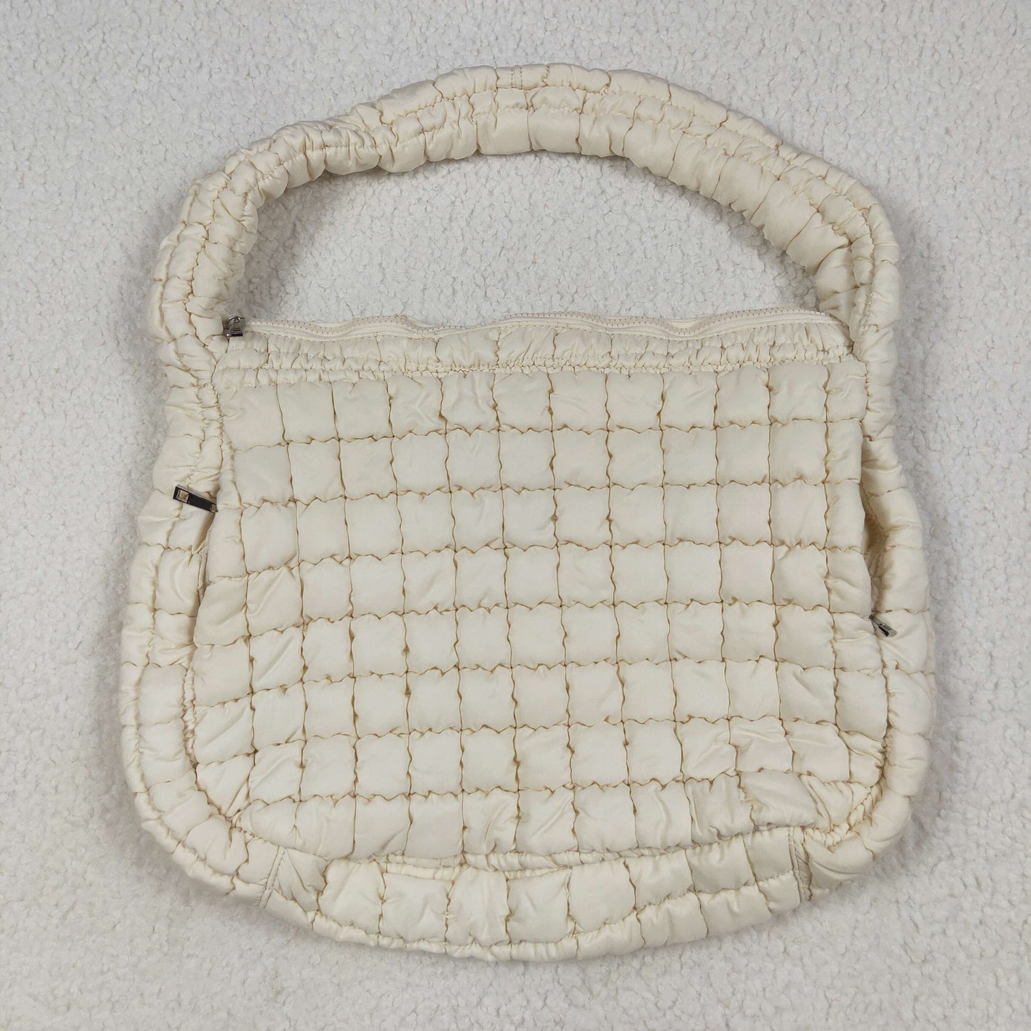 beige puffy tote bag