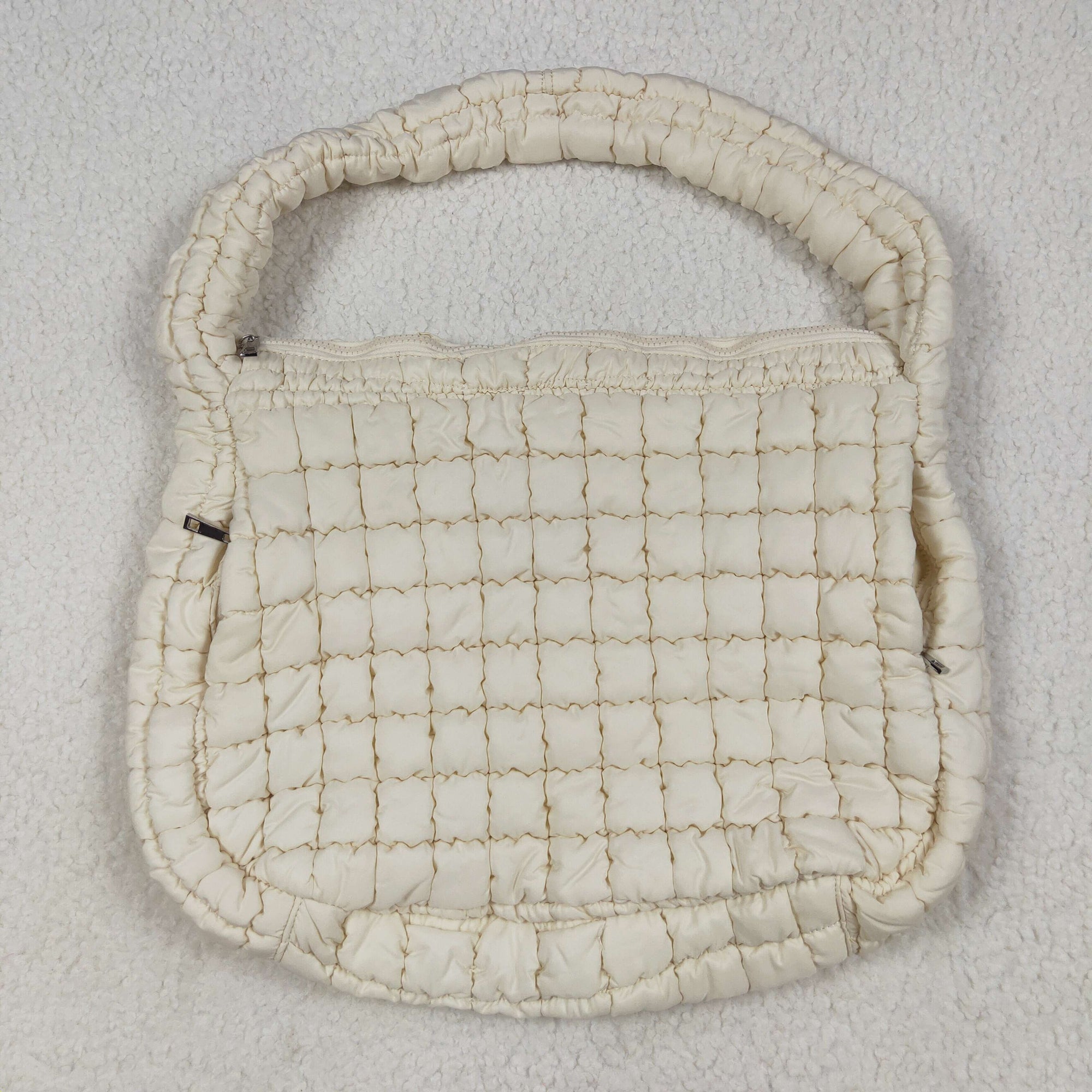 beige puffy tote bag