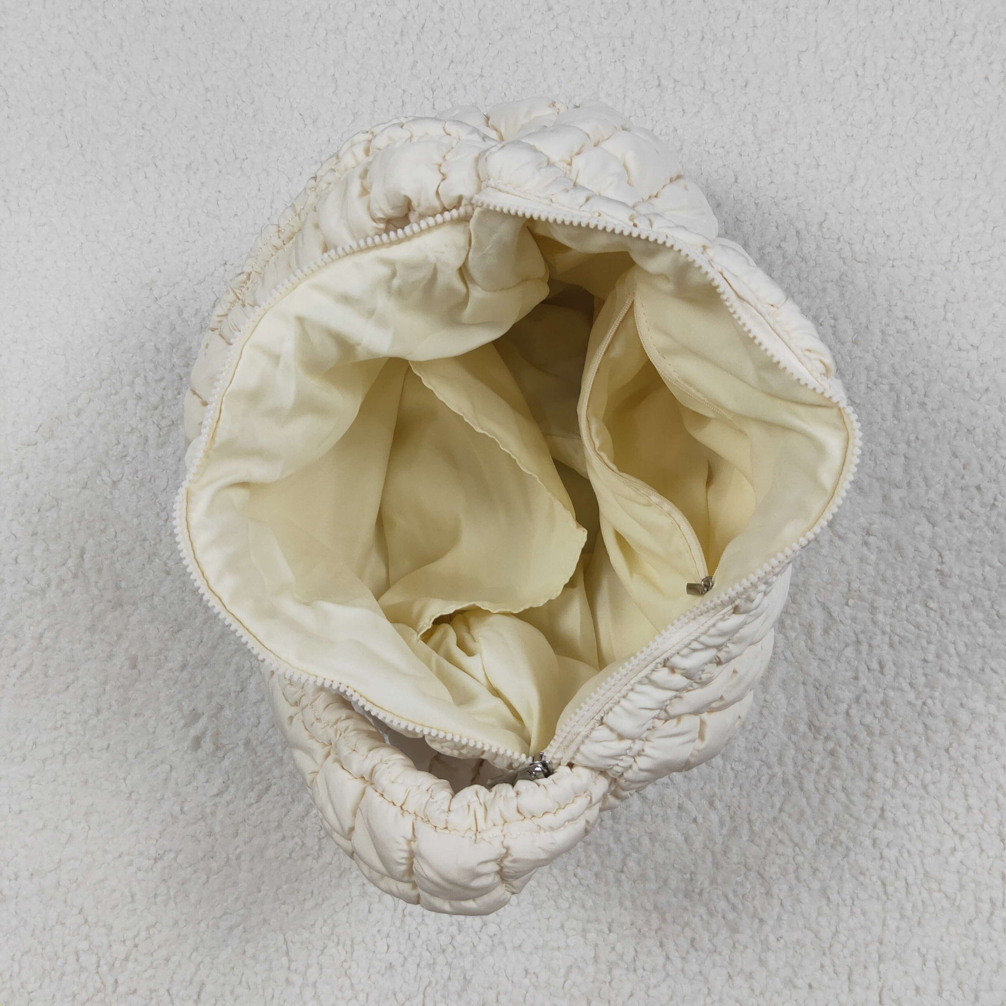 beige puffy tote bag