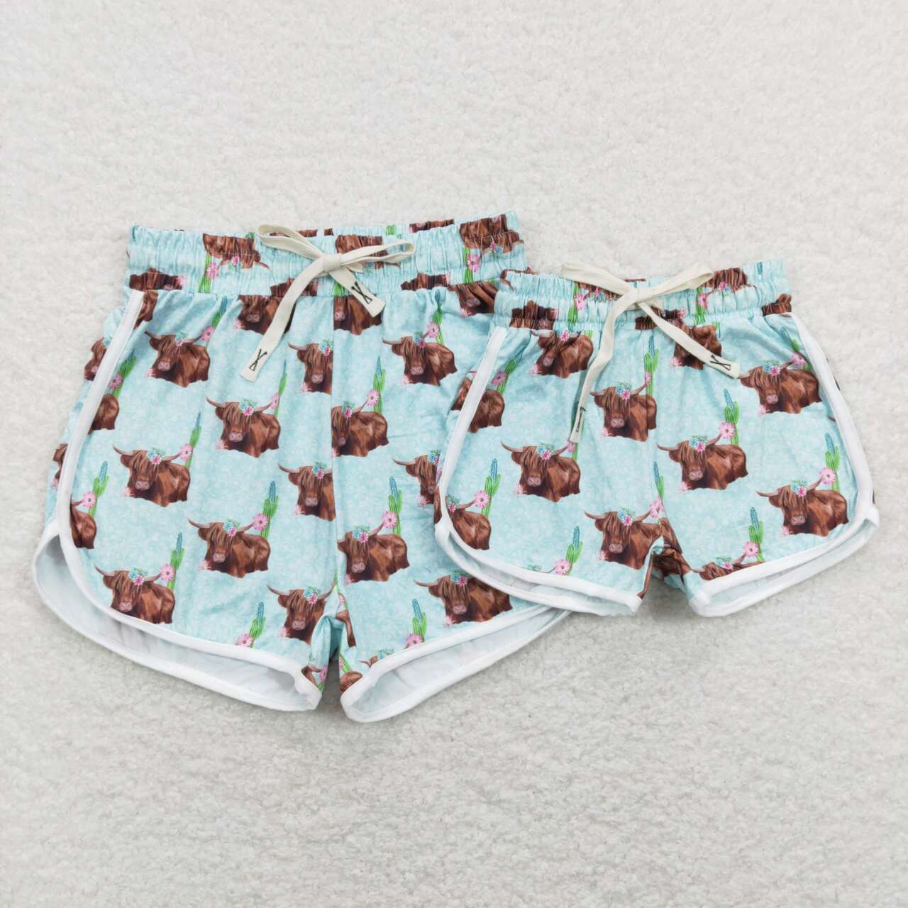 girl 1pc light blue highland cow shorts