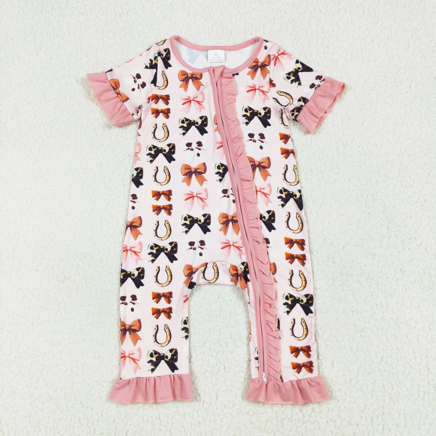 pink cow print bow ruffle zip sleeper