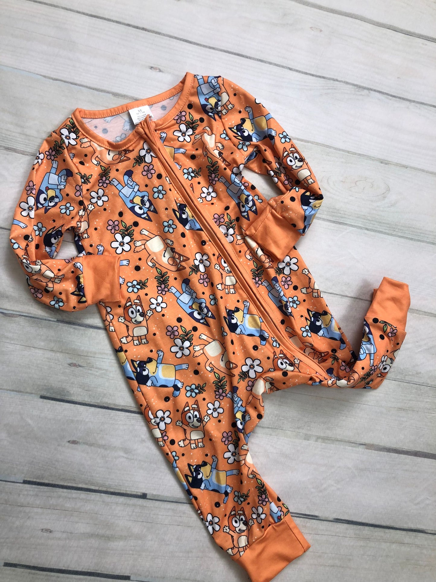 blu*y floral print baby bamboo sleeper orange