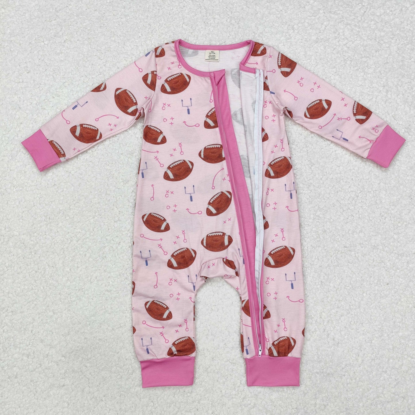 pink baby girl football print zip bamboo sleeper