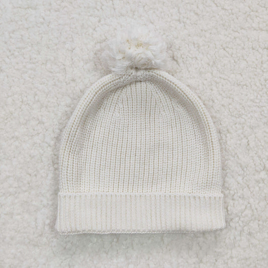 White wool pom pom cap