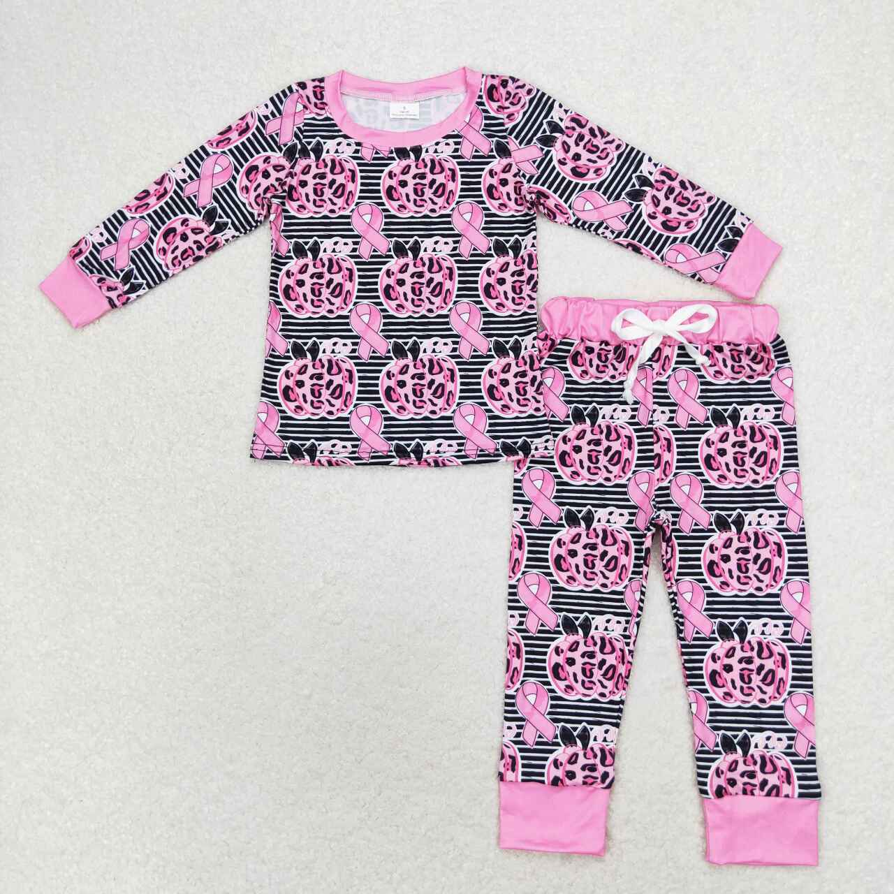 In October we wear pink pumpkin pajama girl