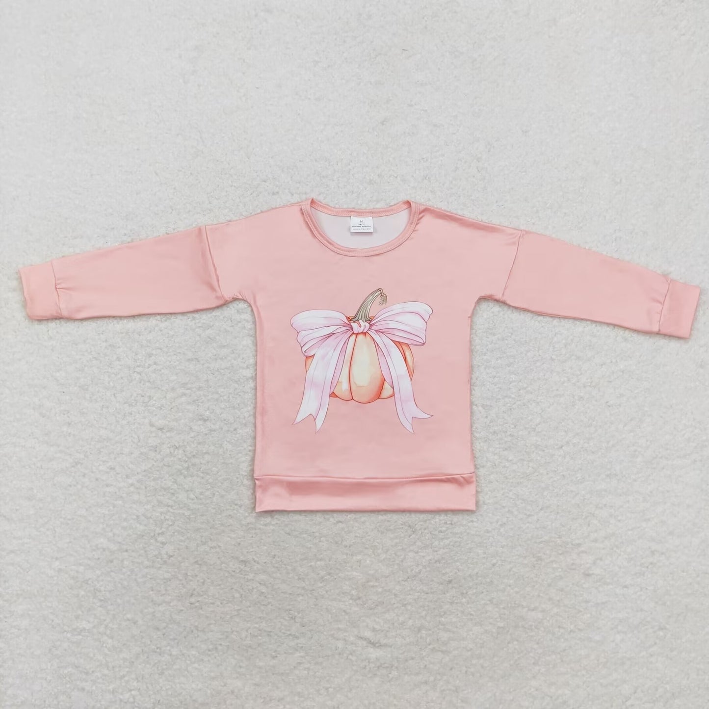 pink shirt with pumpkin pattern