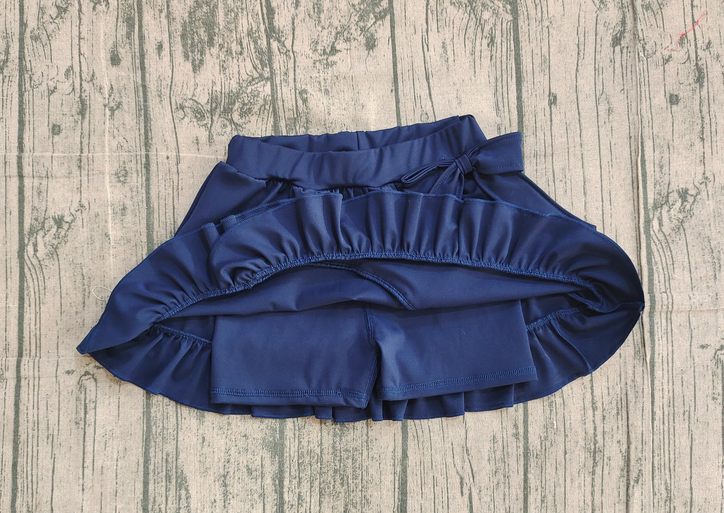 Pre order solid navy ruffle bow athletic skirt