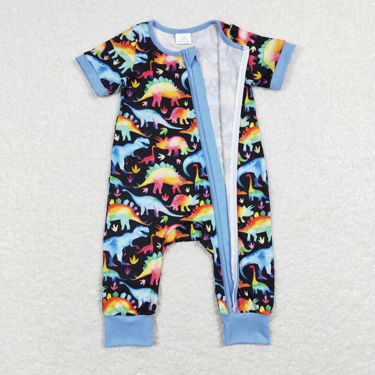 baby boy rainbow dinosaur zip sleeper