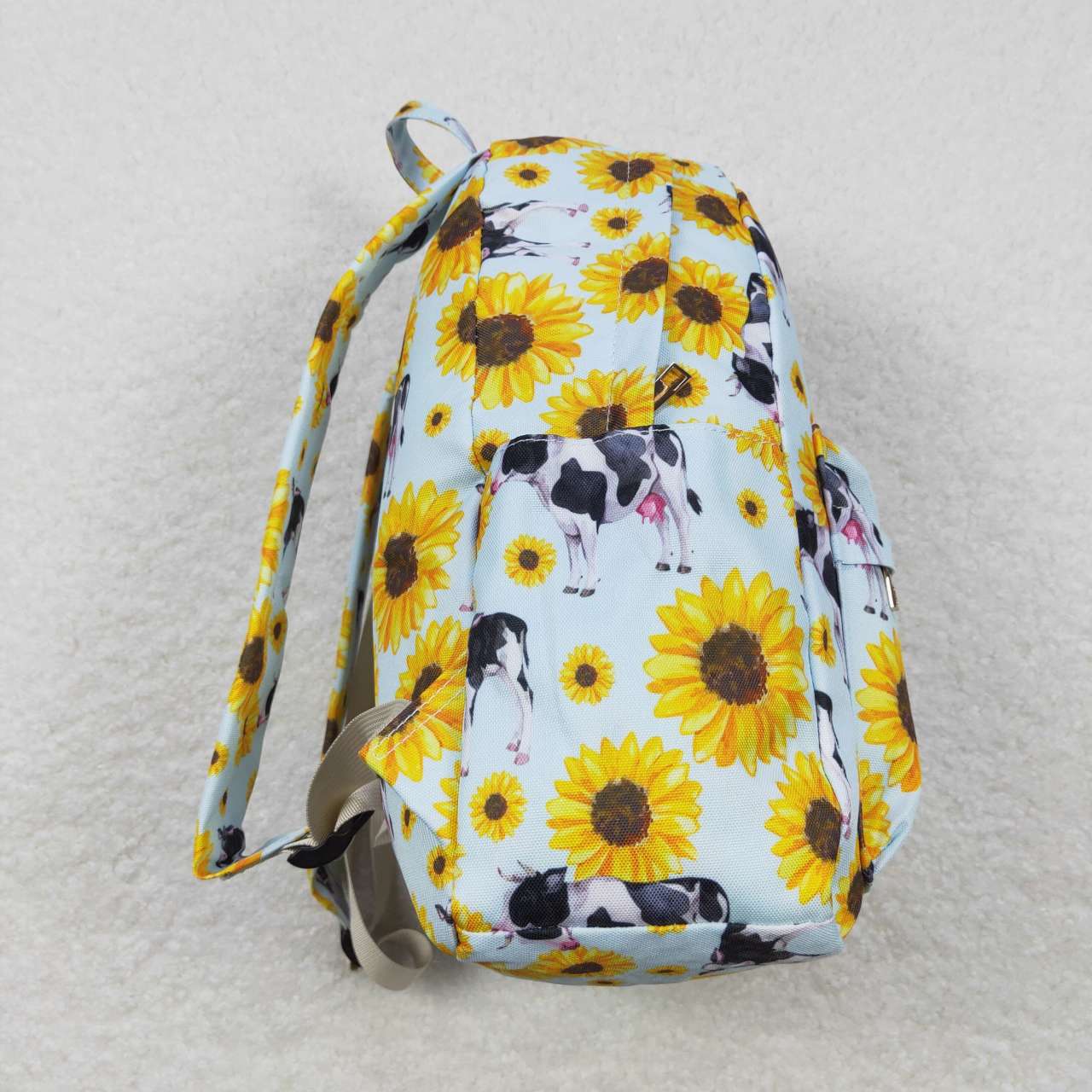 sunflower milk cow print backpack