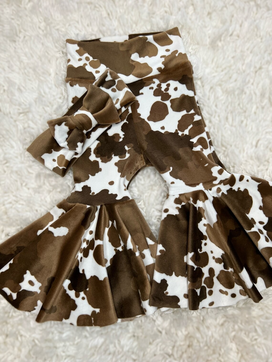 pre order brown cow print flare trousers