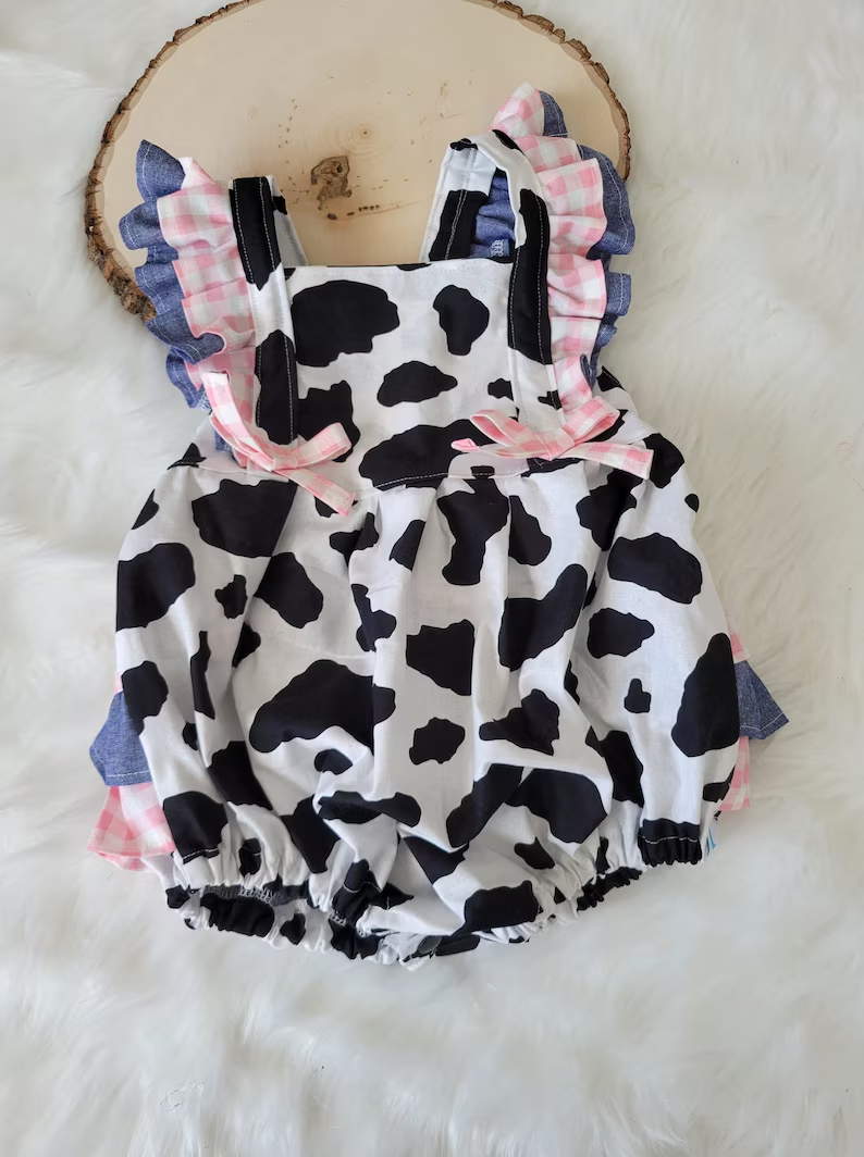Pre order black cow print ruffle girl bubble baby clothing