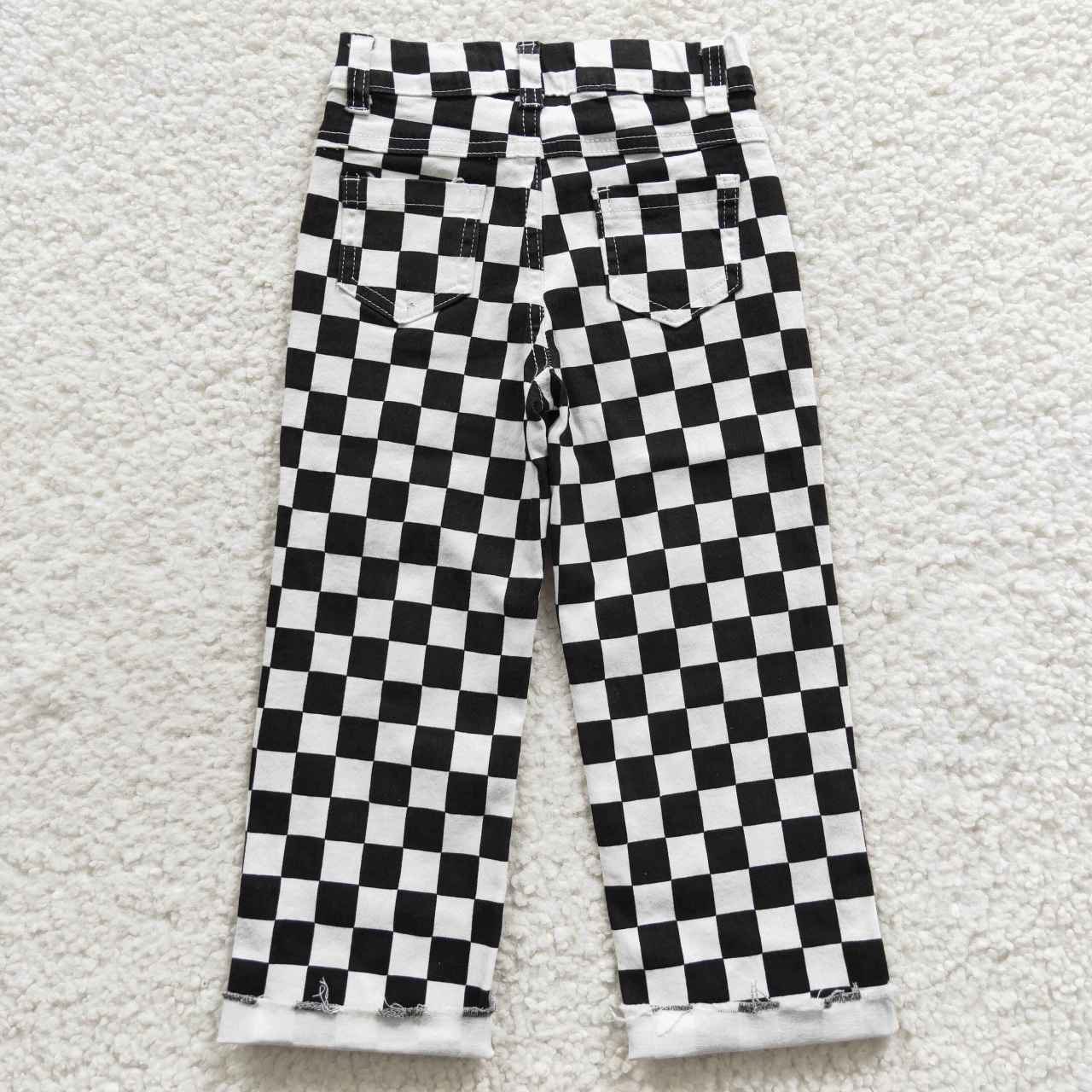 western kids black white checked jean trousers with hole