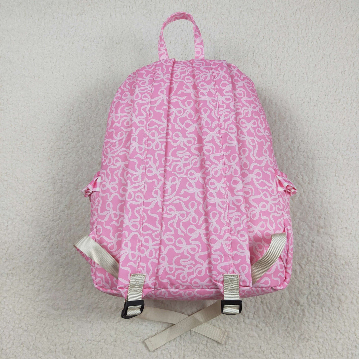 white bow on pink print kids backpack