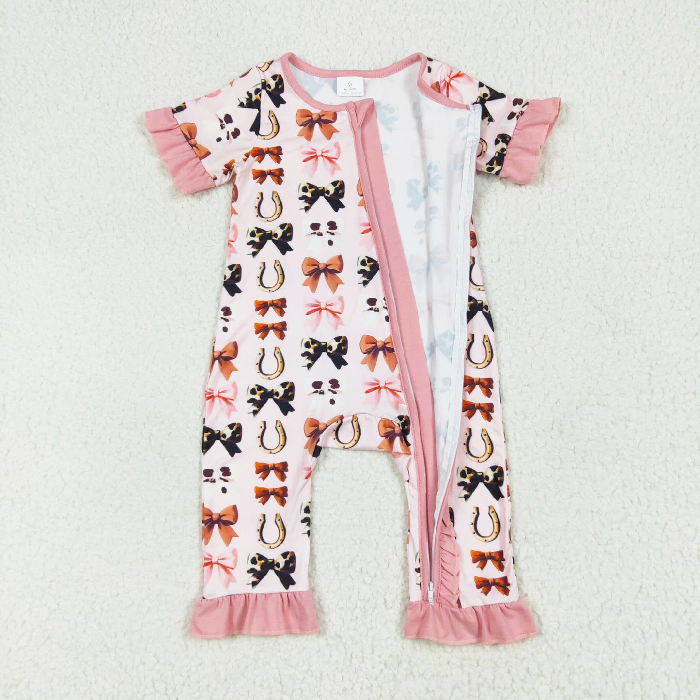 pink cow print bow ruffle zip sleeper