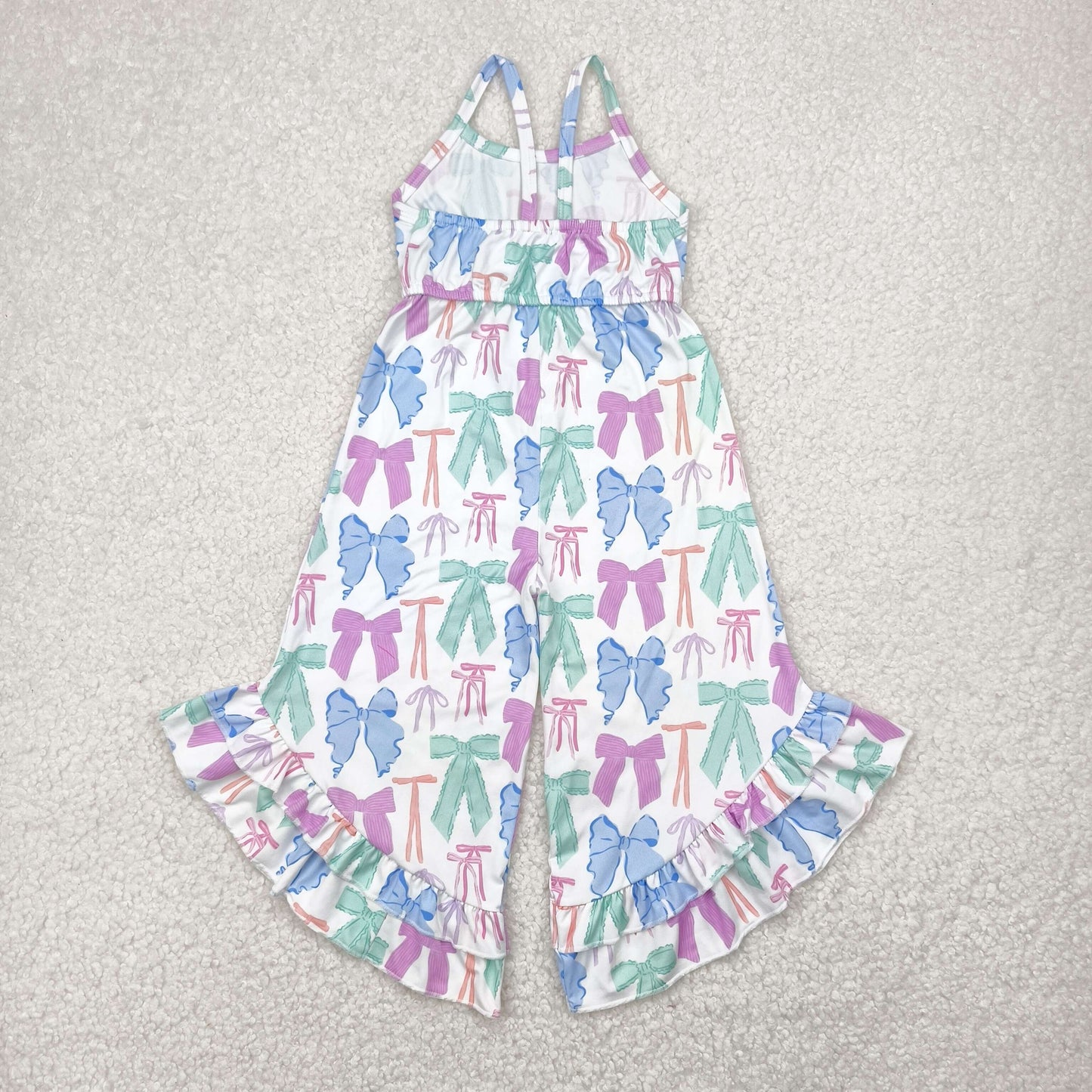 colorful coquette bow strap bell bottom jumpsuit