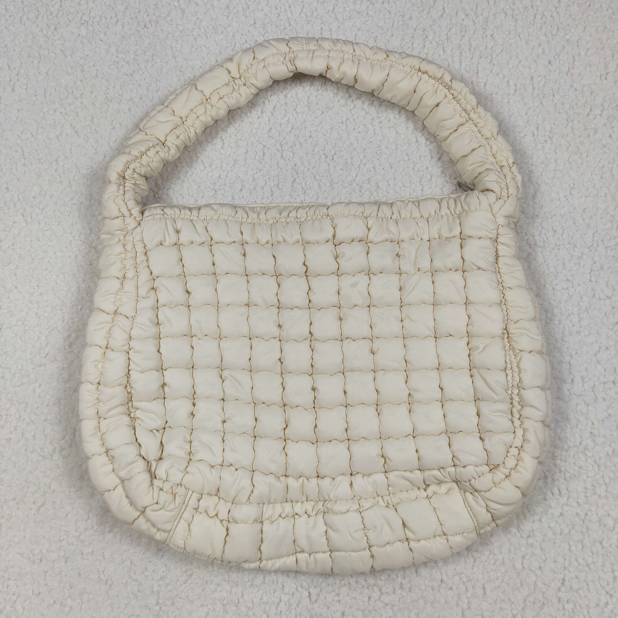 beige puffy tote bag