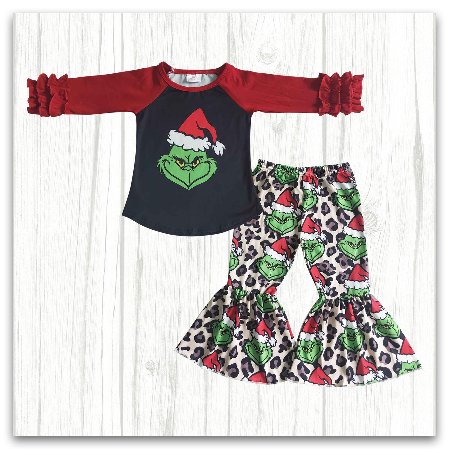 girl red black leopard with grinchey christmas outfit