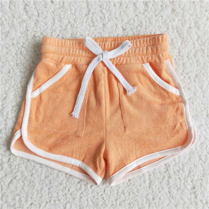 towel material solid color orange shorts with pocket