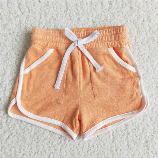 towel material solid color orange shorts with pocket