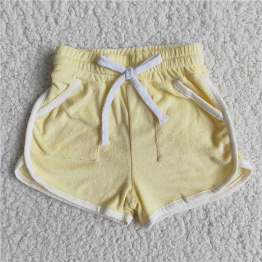 towel material solid color yellow shorts with pocket