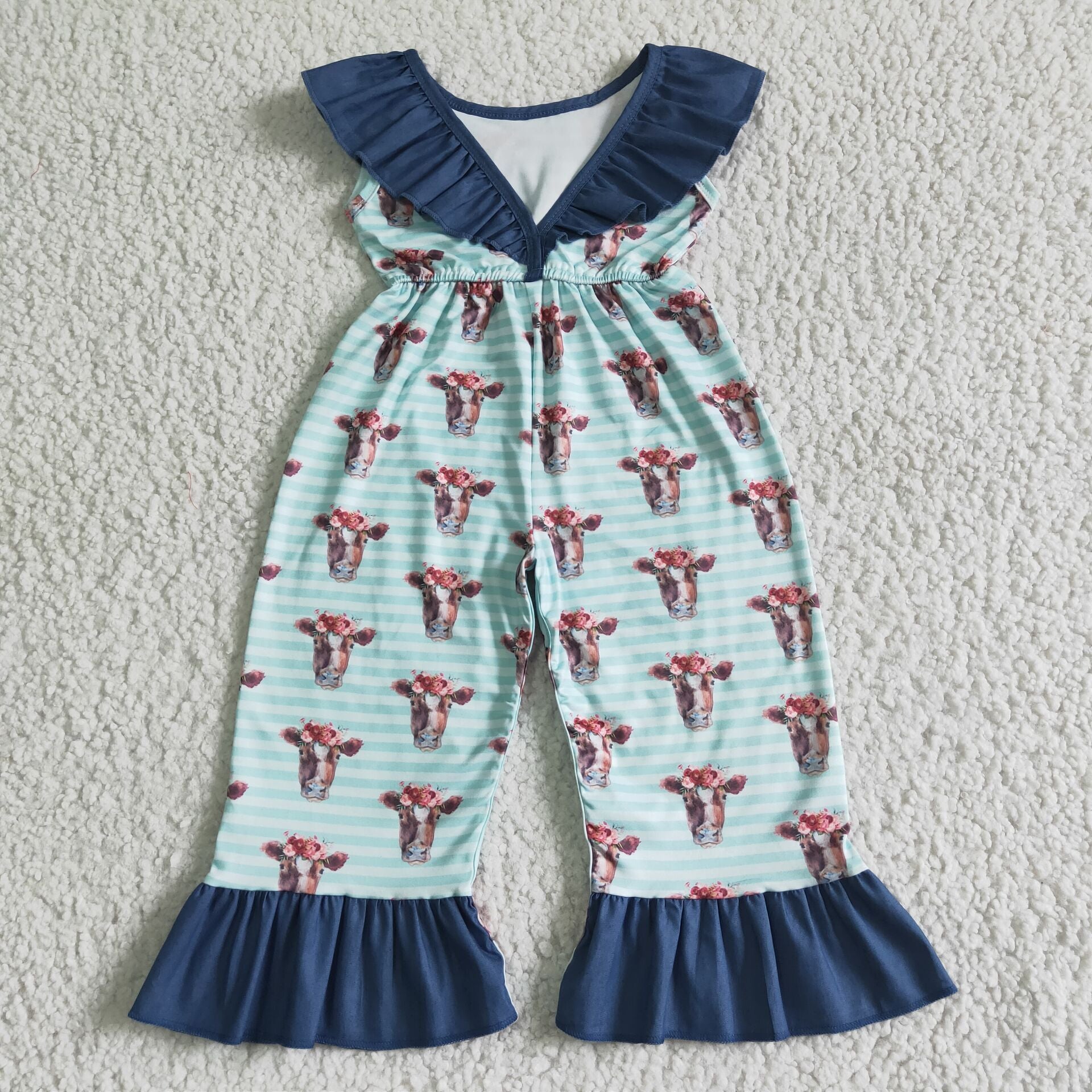 girl’s blue cow stripe jumpsuit
