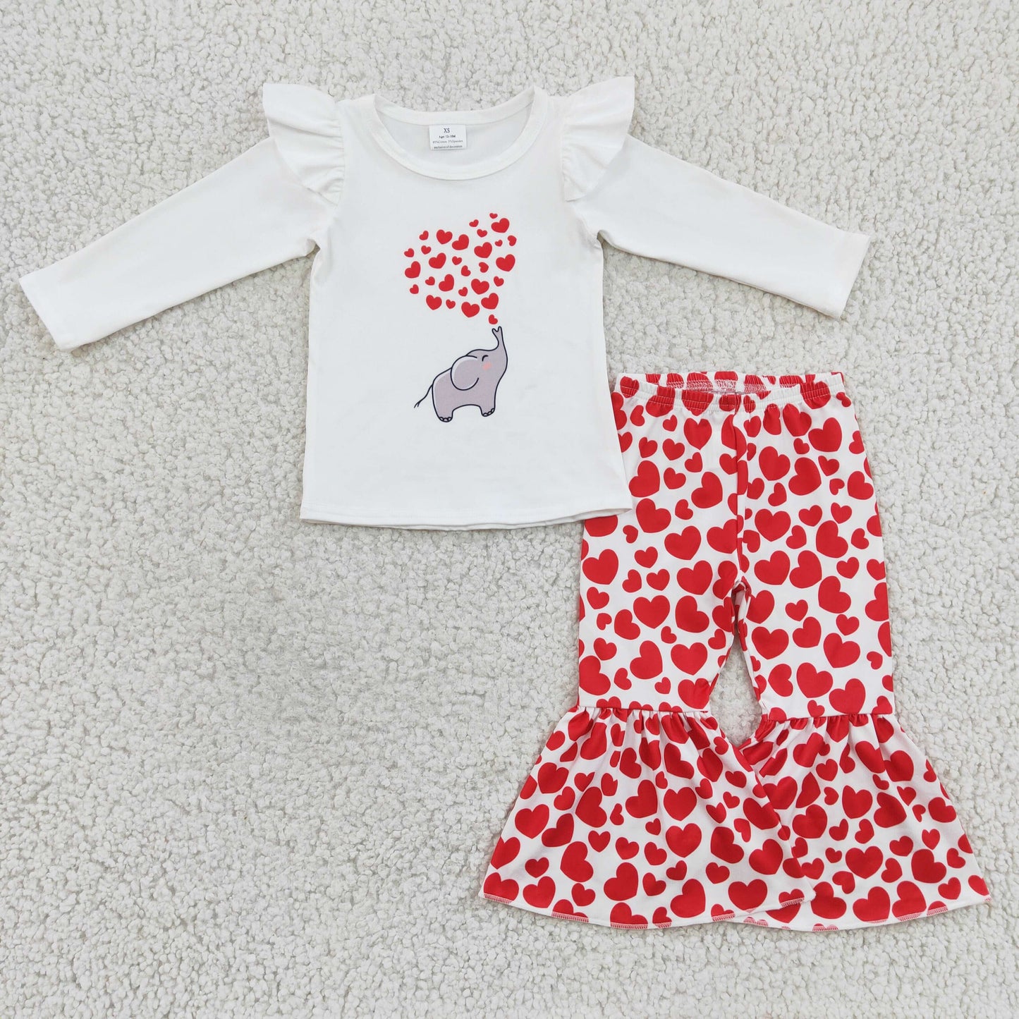 white elephant with red heart valentines clothes